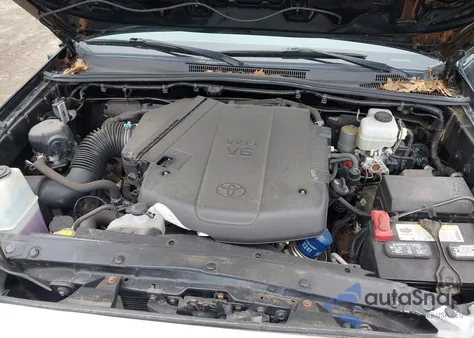 2015 Toyota Tacoma Base V6 из США, поврежденный, VIN 3TMLU4EN2FM202275